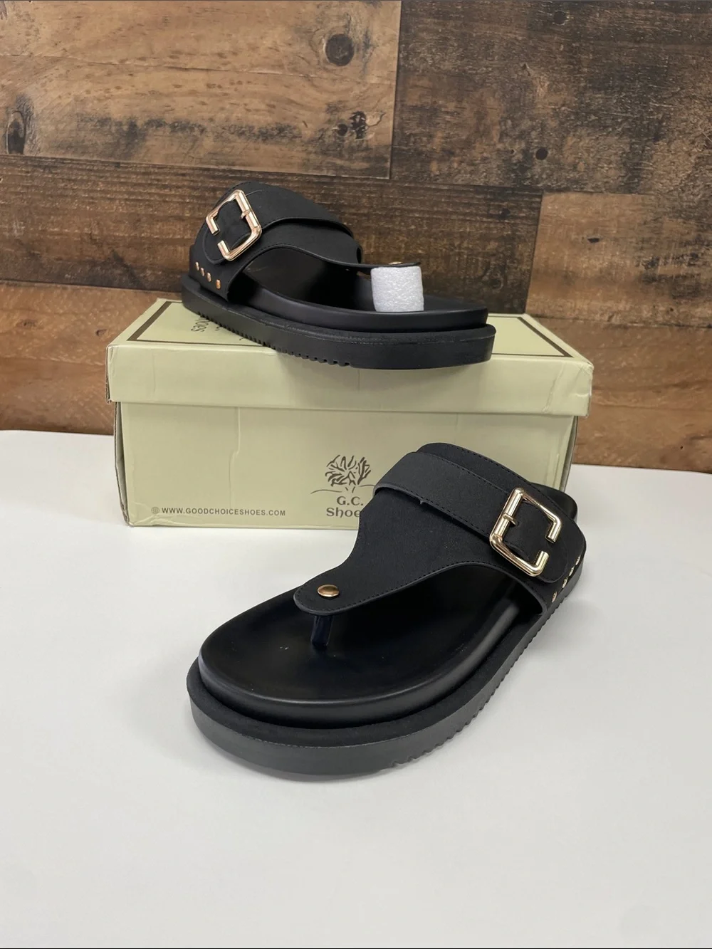 Women’s Black Thong Sandals with Gold Buckle Accent